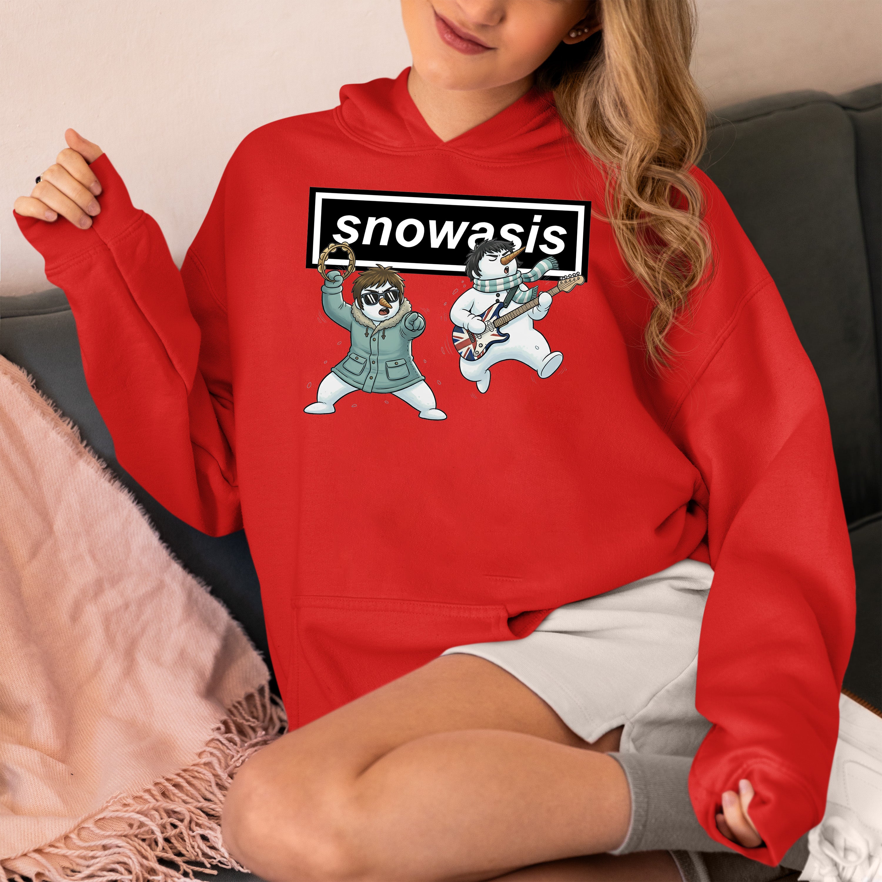 Christmas Snowasis rocking on a snowy hillside, cozy festive scene for holidays, Snowasis rocking on Hoodie